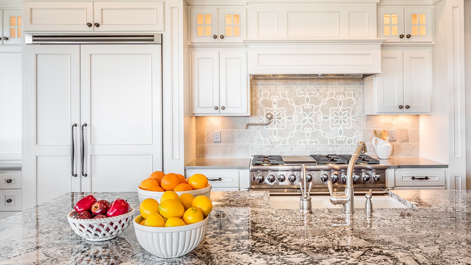 kitchen with granite countertop and fruit